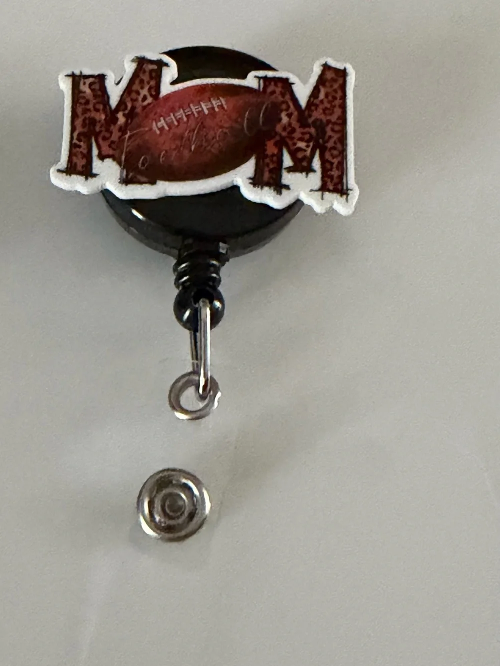 Kids Black Retractable Badge Reel with Maroon 'MOM' Football Charm